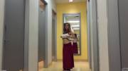 Natalie Austin flashing in changing room hallway [GIF]