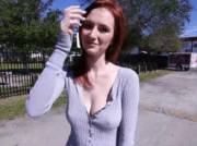 Pale redhead showing and jiggling her breasts