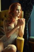 Pretty redhead with lingerie and tea