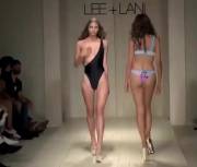 Modeling swimsuits on the catwalk and dat surprise bewb