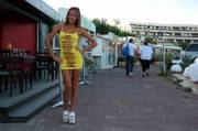 Yellow minidress in public
