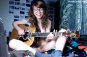 Super cute girl plays original songs on her guitar