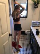 Ok here she is just 5 minutes ago getting ready for the day. I like catching her in her natural moments. Im going to post 3 pics of her that I just took minutes ago. Here she is putting on deodorant. I bought these shorts for her and she likes them. ????