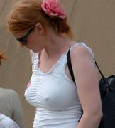 Redhead MILF with a fairly serious rack on her. x-post from /r/braless
