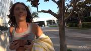 Cute girl exposes her breasts on the street