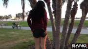 She takes off her shorts and shows her butt at the park