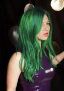 Green hair and shiny dress for New Years Eve