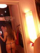 Victoria's Secret must know girls take a lot of selfies in their changing room, so they advertise on the mirrors!