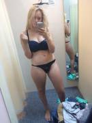 Curvy girl in changing room