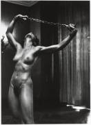 Lisa Lyon with chain by Helmut Newton, Paris, 1980