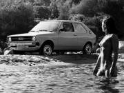 Lady in the water with her brand new Audi 50 (70s)