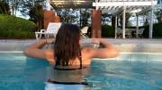 Slo-Mo getting out of the pool [f]rom Behind