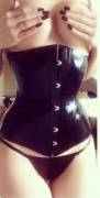 Shiny constrictive corset