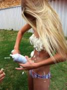 Is there an album or more pictures of this girl putting whipped cream on herself?