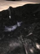 Babygirl's Black PVC skirt that she's wearing for our play date this weekend. This is the third actual load I've added. If you look close, you can see lots of streaks from the last time we played with frozen cum and as it melted, it got rubbed in. She's s