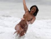 Sundy Carter losing her top at the beach.