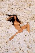 Paula Pritchett on a pile of cotton