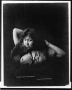 "Reverie of a Stickene Maiden" photograph of a Native North American Woman (1906)
