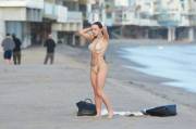Francesca Eastwood (Clint's daughter) topless on a beach