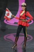 Canada's beauty queen at the Miss Universe with her flag as a mounty (x-post /r/FlagBabes)