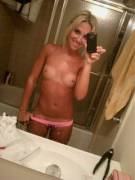 Skinny blonde mirror selfie