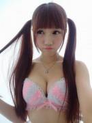 Cute big boobed japanese teen with pigtails