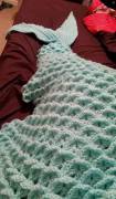 My Daddy's mother made me a mermaid tail blanket 