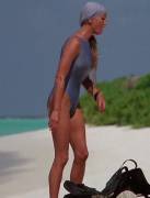 Bo Derek undressing on the beach [gif]
