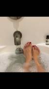 Relaxing in the tub, who wants to rub these pretty feet?