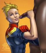 Captain Marvel says "We Can Do It!"