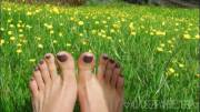 Me and my toes/feet in a field of buttercups :)