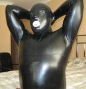 Full rubber gimp for rubber slavery and training in UK