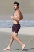 Taylor Lautner on the beach