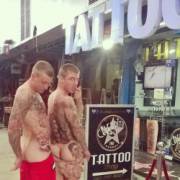 Showing Off Their Tattoos