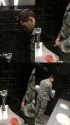 Military guy taking a piss