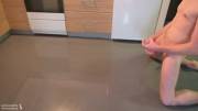 Cumming on a kitchen floor