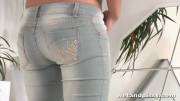 pissing in her tight blue jeans
