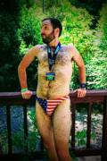 Finished my first triathlon of the year yesterday -- posing with my medal and my most patriotic Speedo before taking a dip in the river to cool off :)