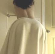 Wiggling that bath towel right off her impressive ass [gif]