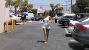 Lily Ivy flashing in parking lot