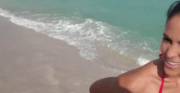 Jasmine Caro flashing her boobs on the beach [gif]
