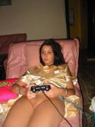 Gaming with her pants off