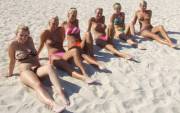 Blondes laying on the beach