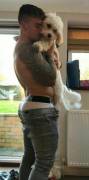 Fitness Model Chris Hatton Cuddling His Dog