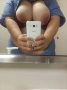 Nurse was in the bathroom when her tits popped out!