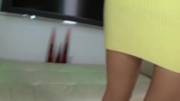 Tanned CLB under yellow sweater dress