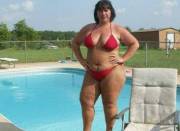 BBW MILF showing off her tiny red bikini at the pool (1 more in comments)