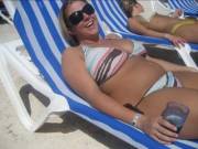 Small belly on this tan beach babe