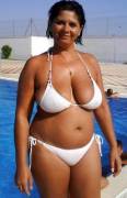 Big tan tits look best in a simple white bikini