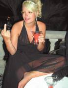 Lilly Allen flipping the bird and showing her pussy